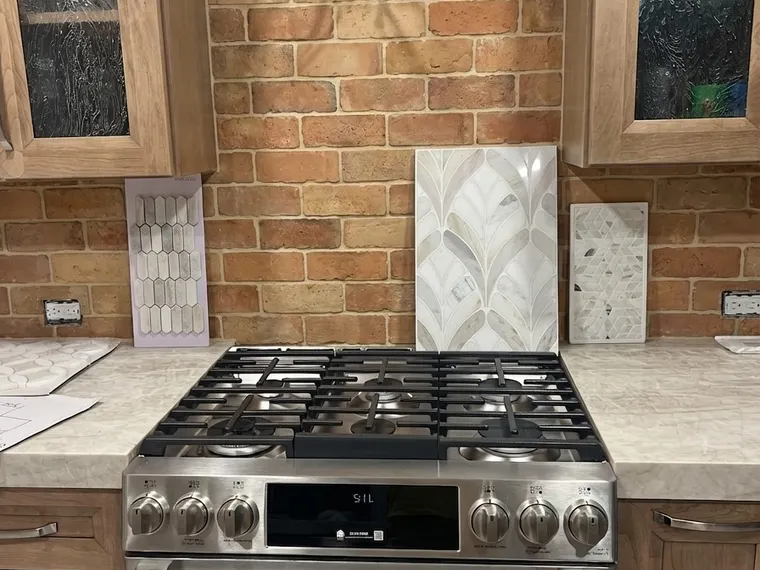 Kitchen renovation idea: terracotta tile backsplash on honey oak kitchen