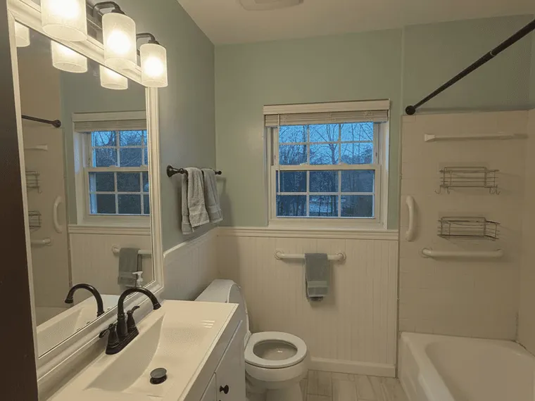 Bathroom renovation idea: coastal bathroom with pale green and white finishes
