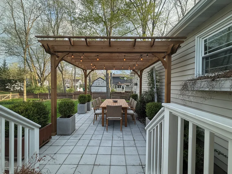 Landscaping idea: backyard dining pergola over a paved terrace