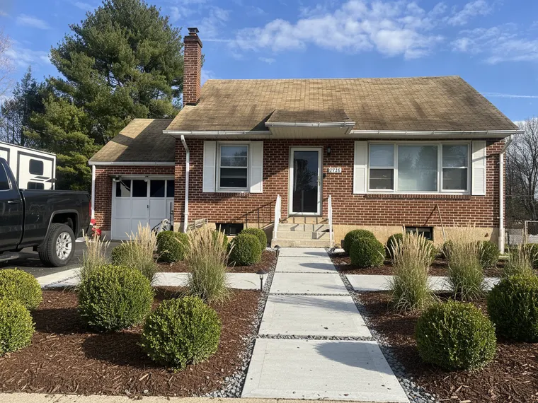 Landscaping idea: modern minimal front yard with structured planting
