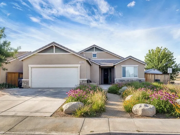 Landscaping idea: lawn replaced with prairie grasses and perennials
