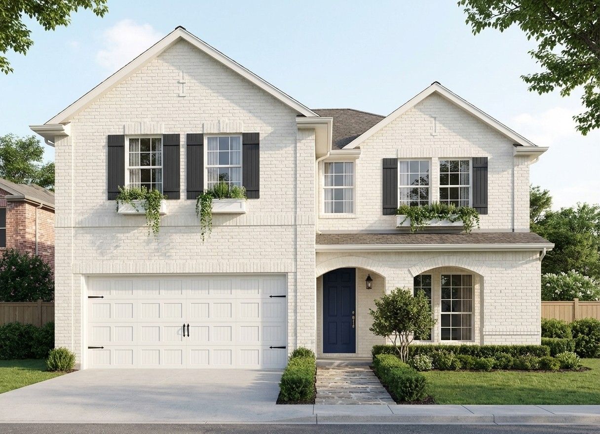 Limewashed white brick exterior with navy front door and window boxes
